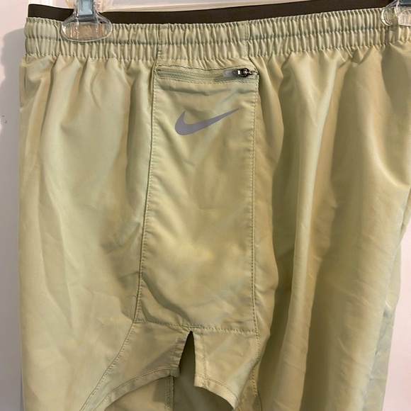 Nike Dri-fit run short with side zipper pocket.  Celery color - Picture 4 of 4